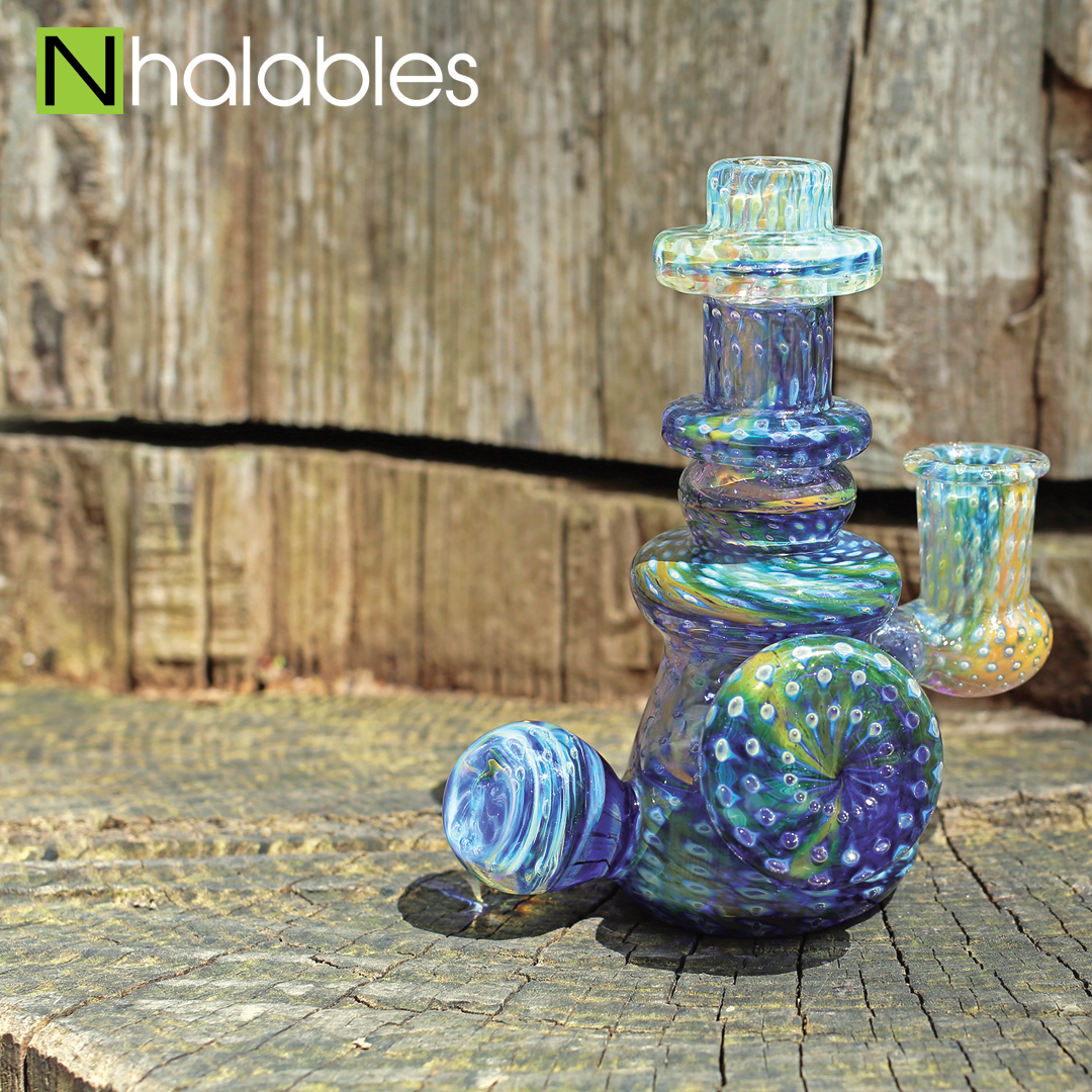 Nhalables Social Post showing a Fumed Bubbled Trap Glass Banger hanger Oil Rig By Cleveland Artist Durin K